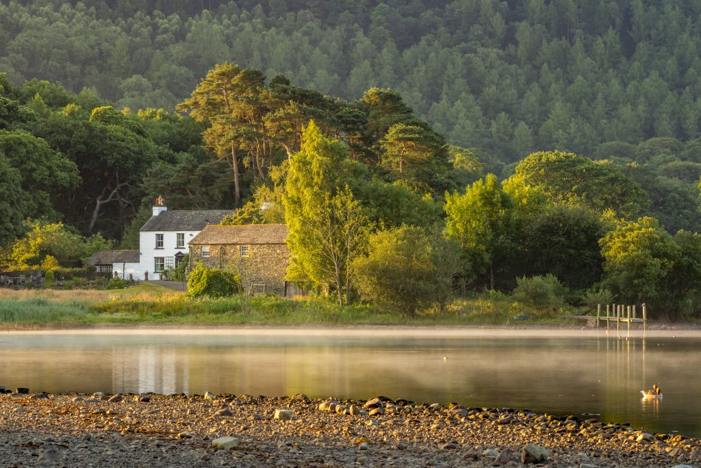 house and lake in lake district england
