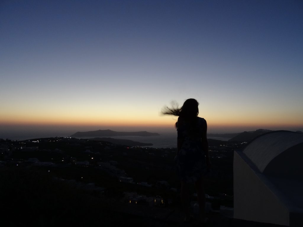 watching the sunset in oia