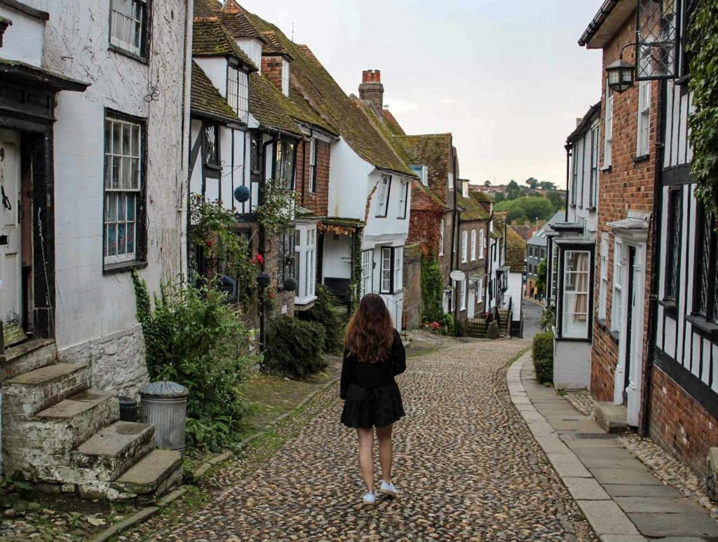 lady walking on mermaid street rye