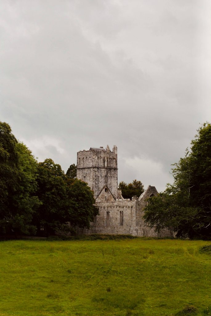 exterior of muckross abbey by michaela murphy on unsplash