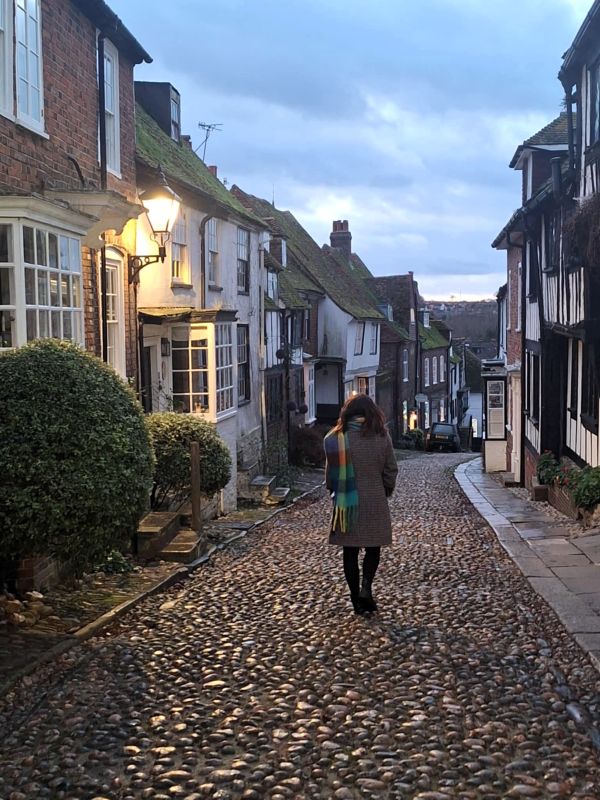 lady on mermaid street winter evening