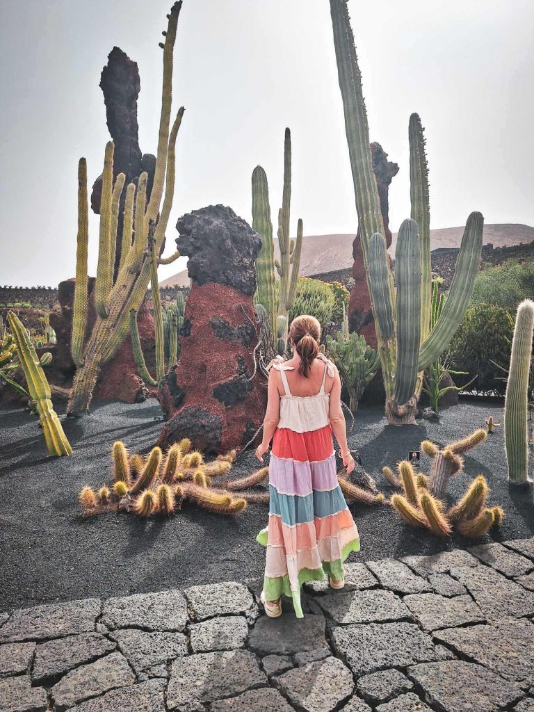 lady posing at cactus garden lanzarote