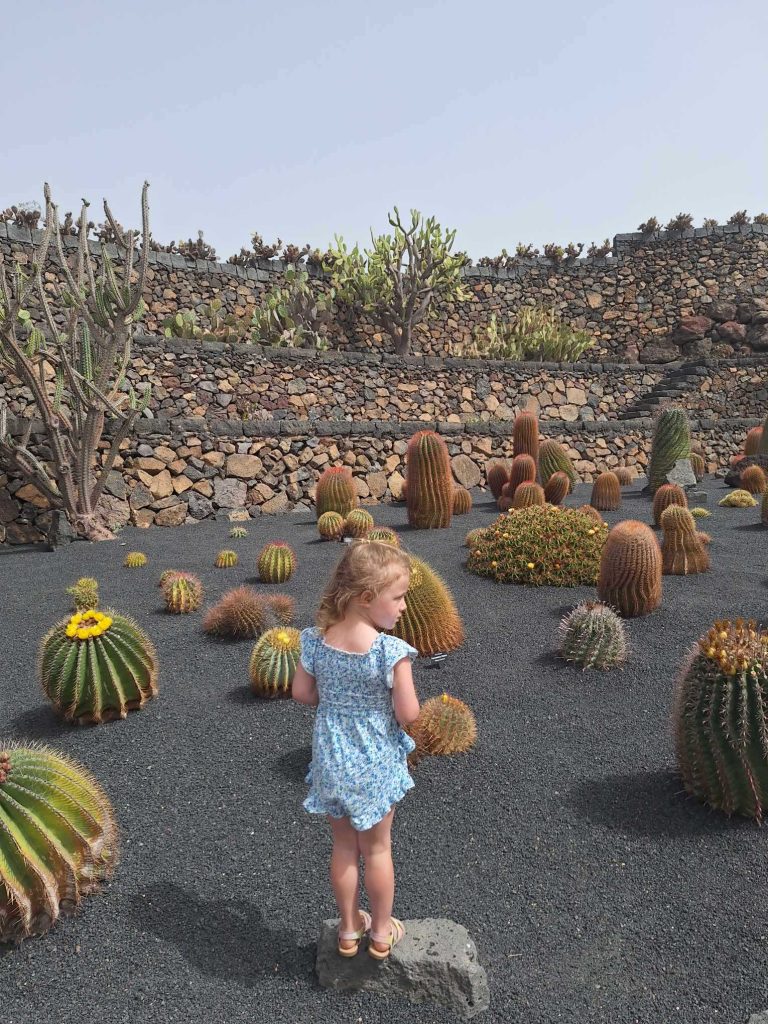 little girl posing at cactus garden lazarote