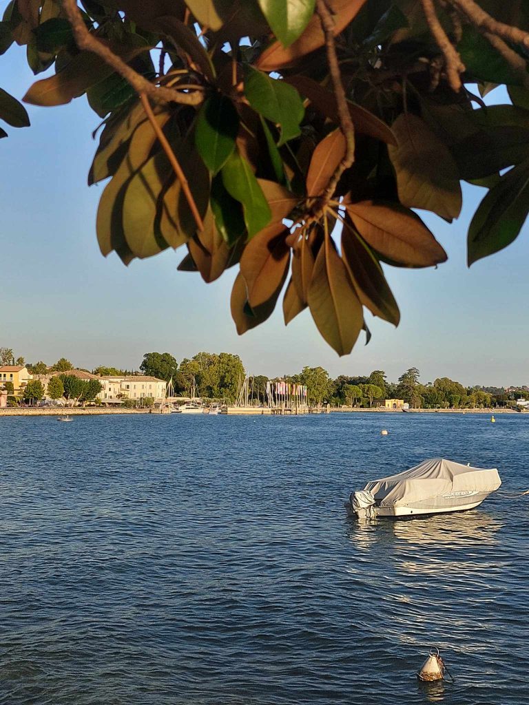 boat in the water in bardolino