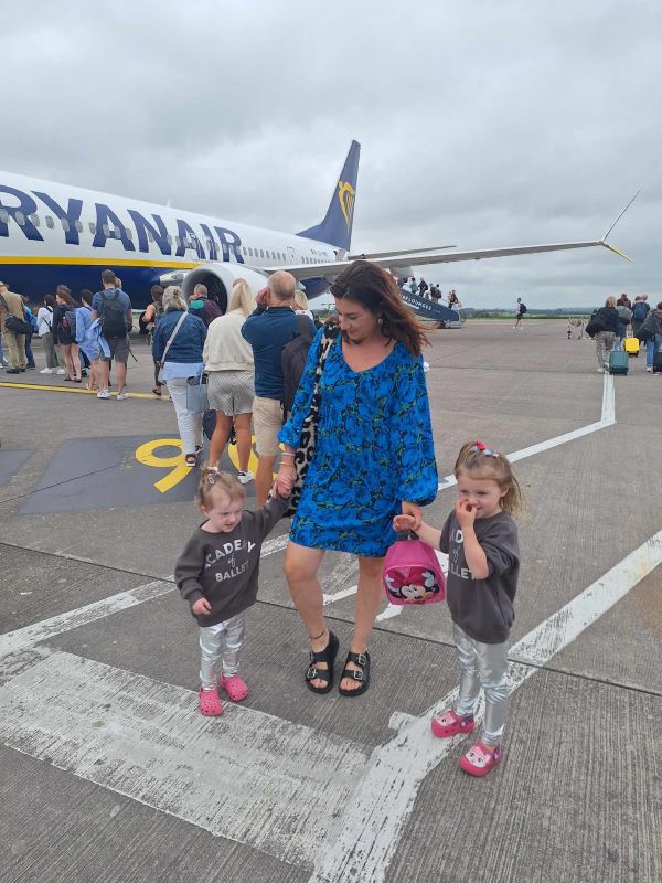 family boarding flight