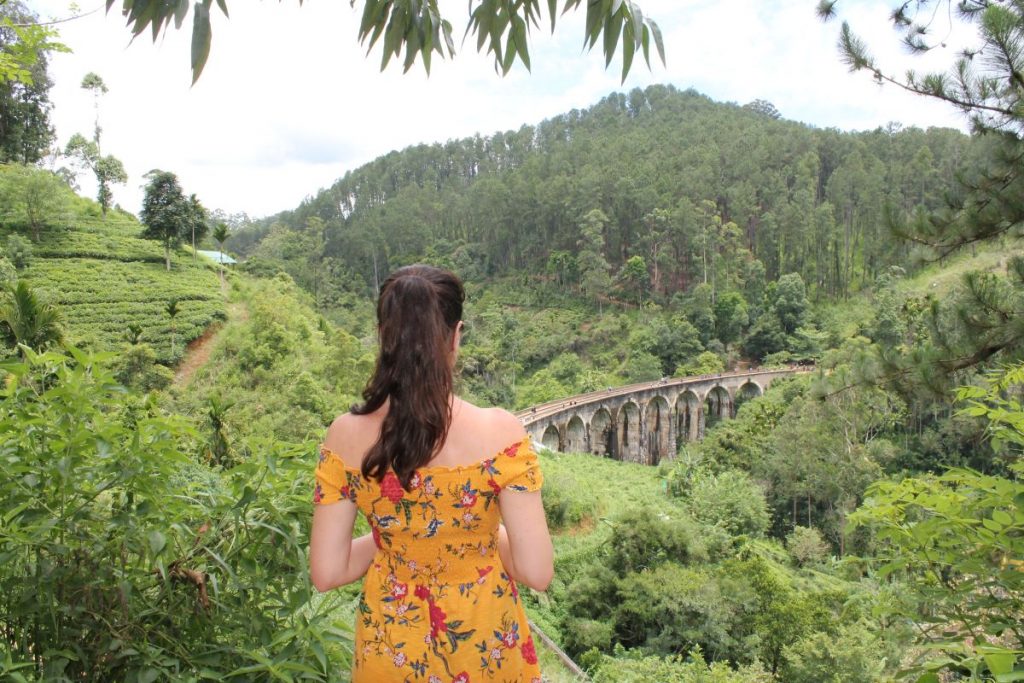 lady at viewpoint of nine arches bridge