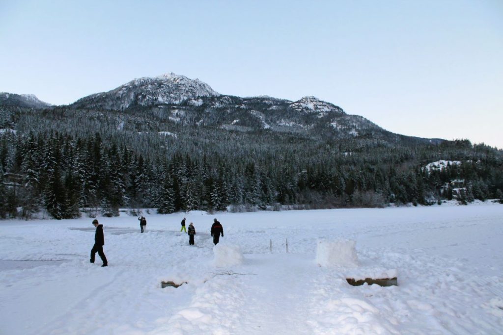 people ice skating nita lake whistler