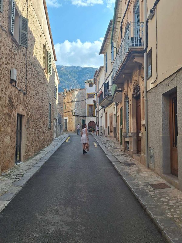 lady on street in soller