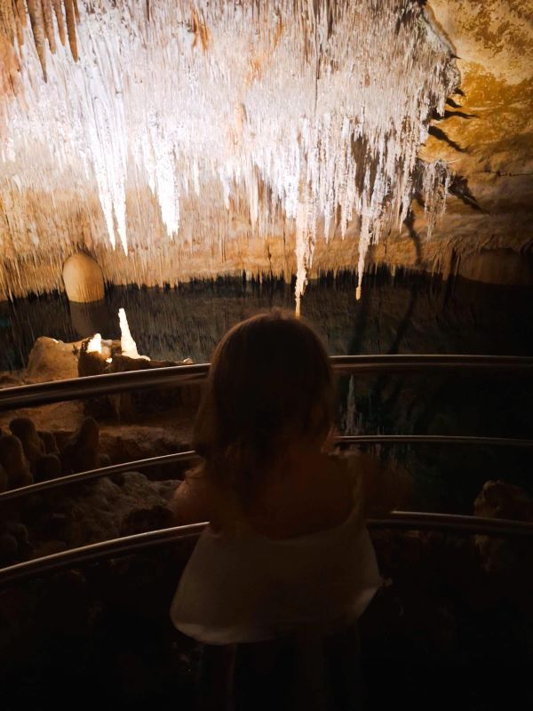 young girl at drach caves