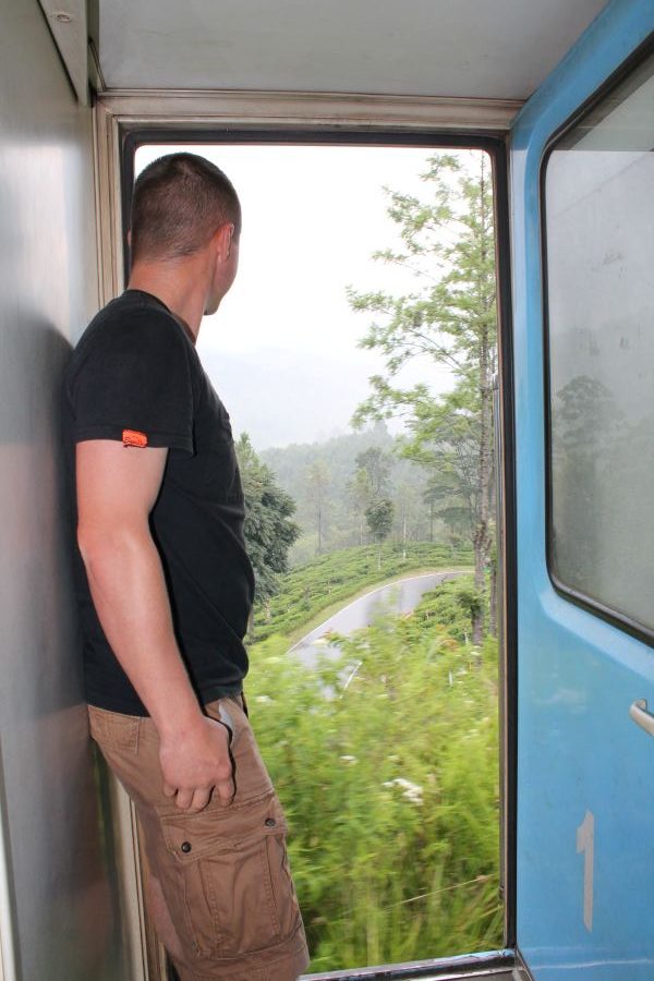 man posing on train kandy to ella