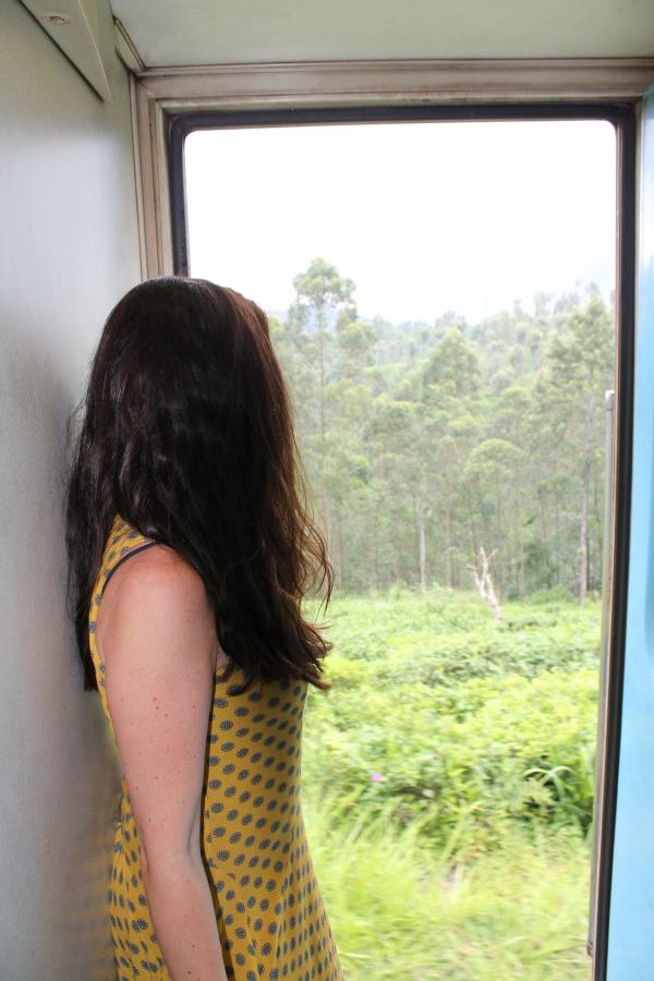 lady posing on train kandy to ella