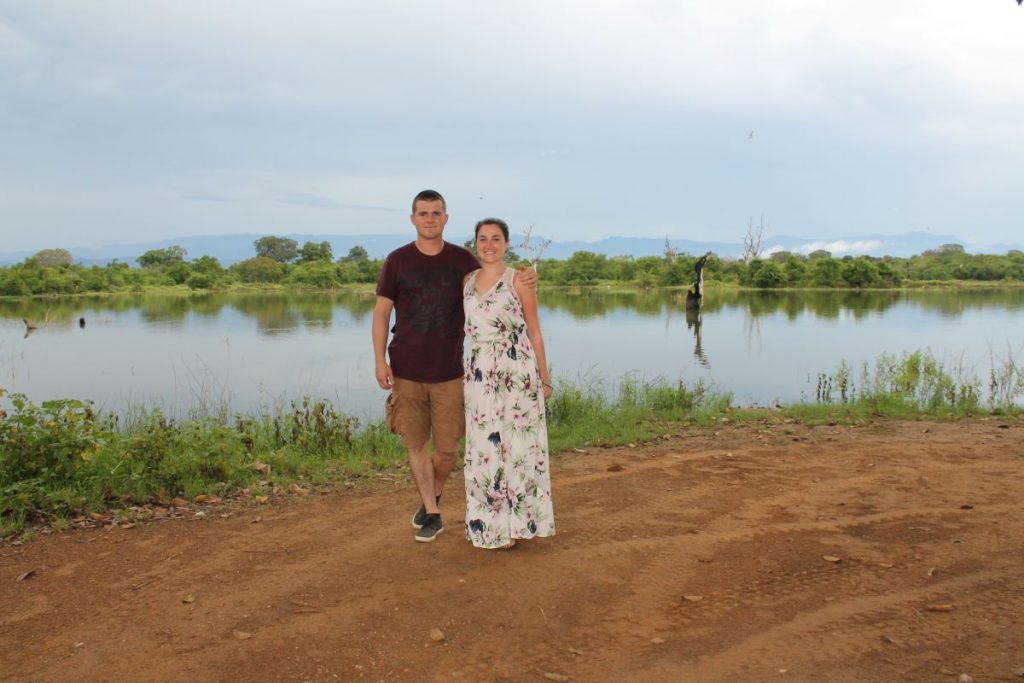 couple at a lake in udawalawe national park