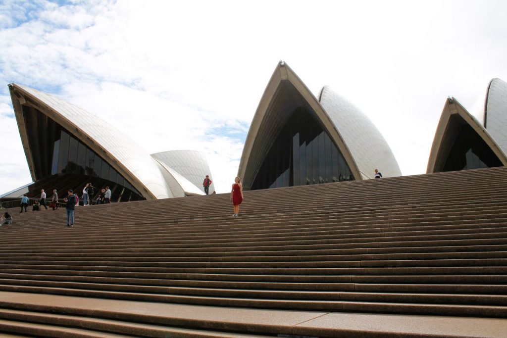 lady on steps of sydney opera house