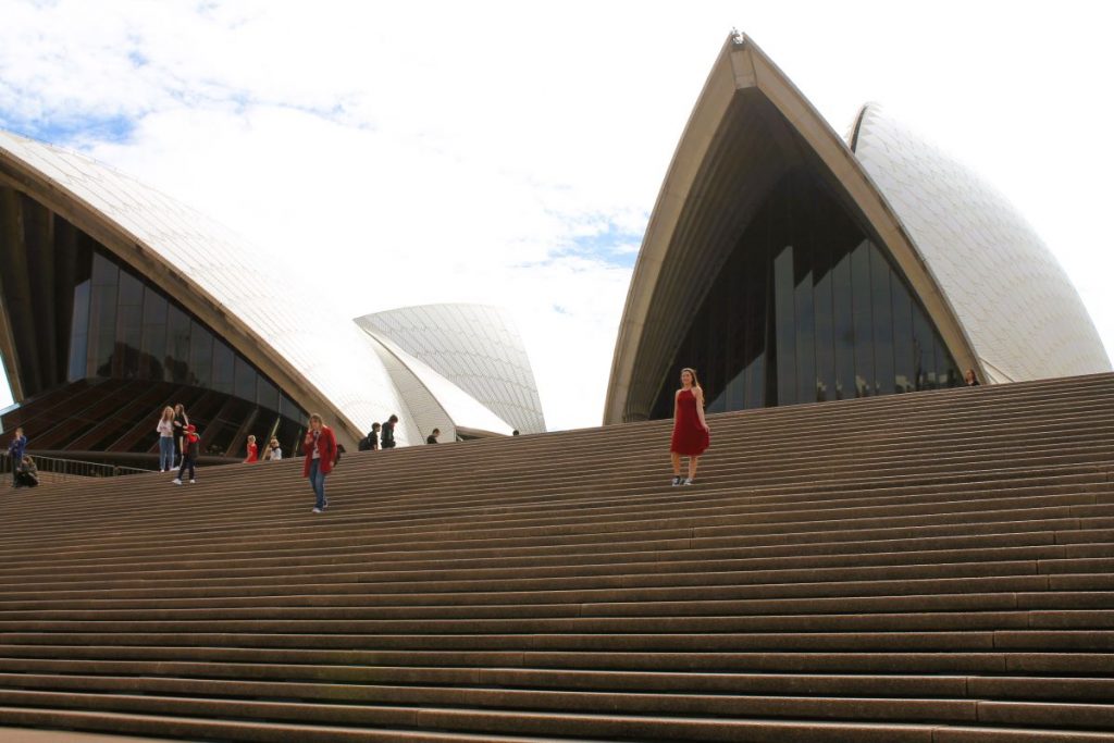 lady on steps of sydney opera house