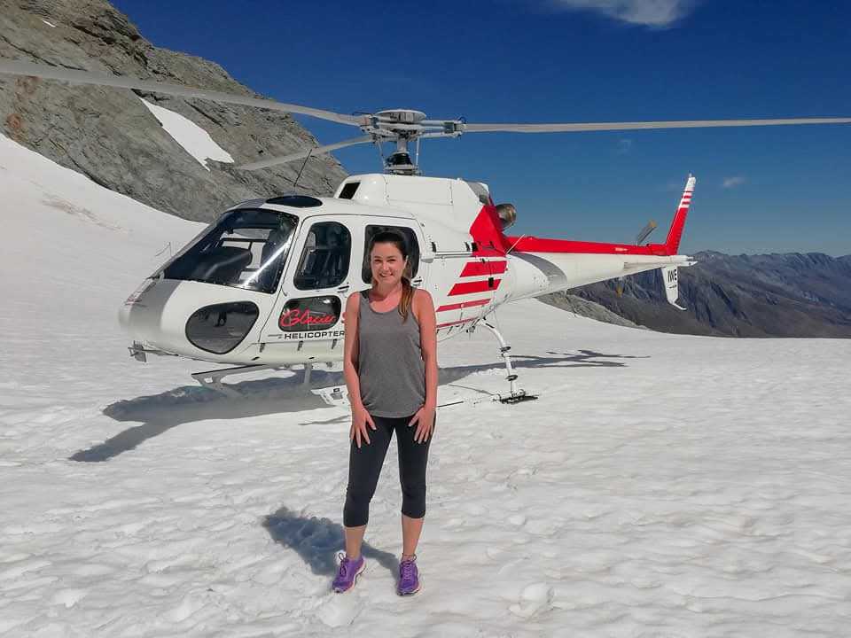 lady on a helicopter tour queenstown