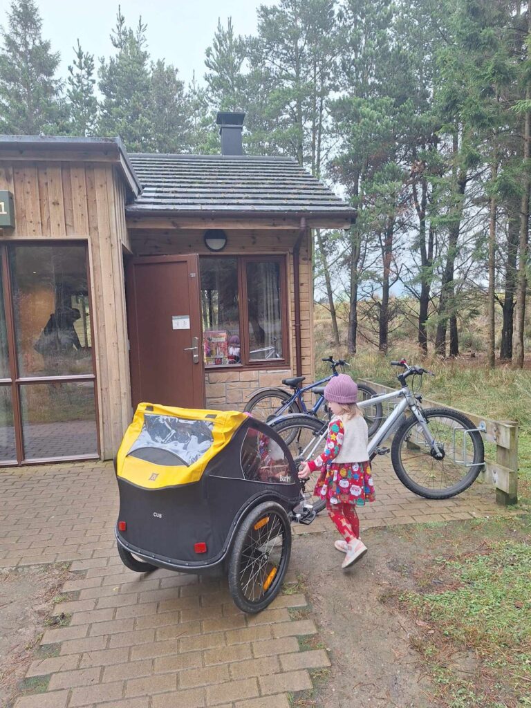 girl outside woodland lodge center parcs