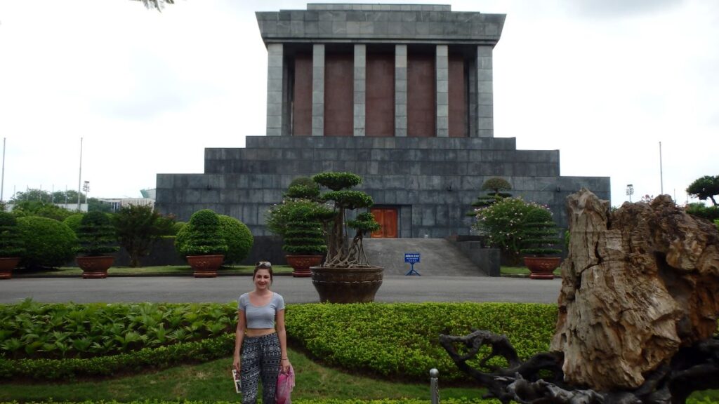 girl outside mausoleum complex hanoi