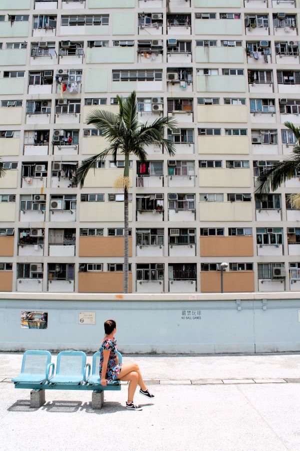 lady sitting choi hung estate hong kong