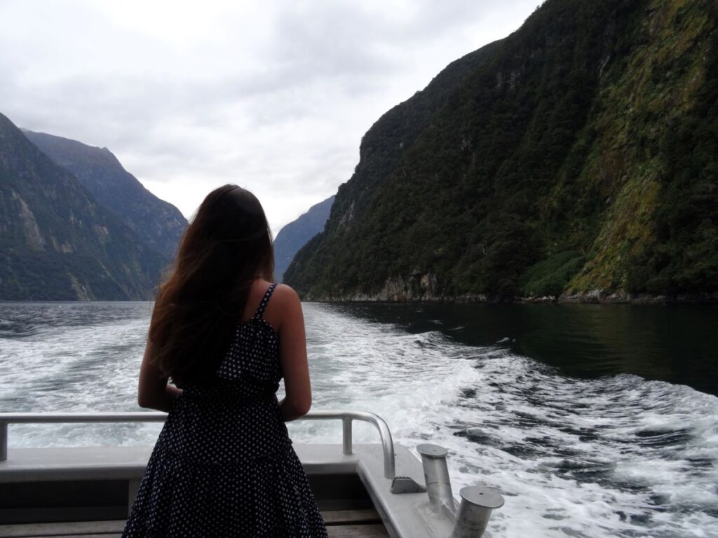 lady on milford cruise new zealand 