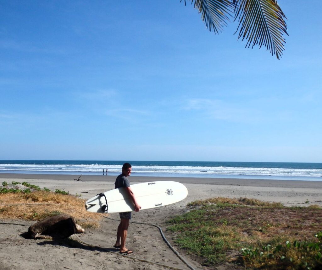 man surfboard el cuco beach