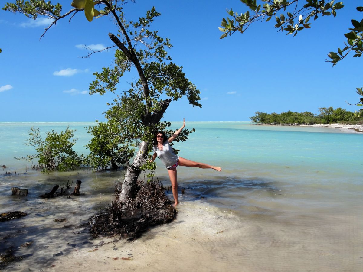 lady secluded beach holbox