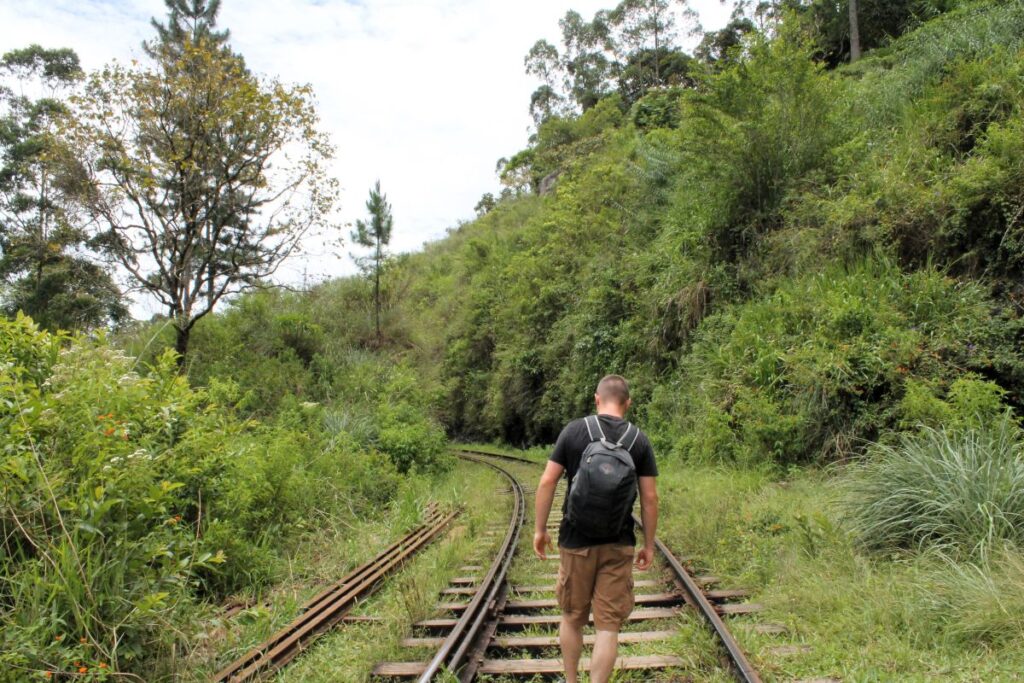 man on train tracks ella