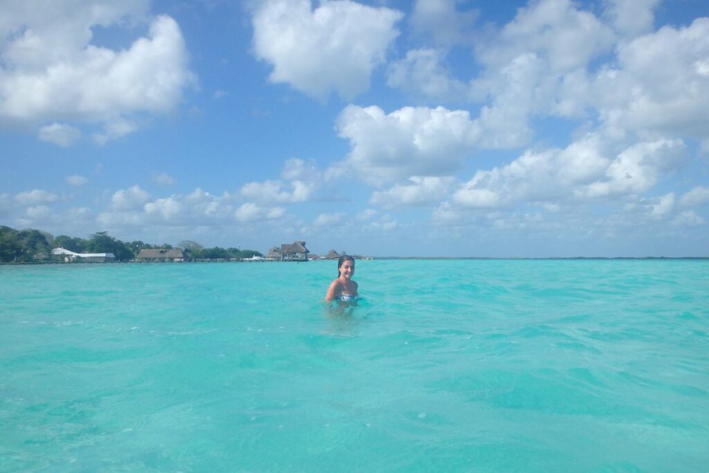 lady swimming laguna bacalar