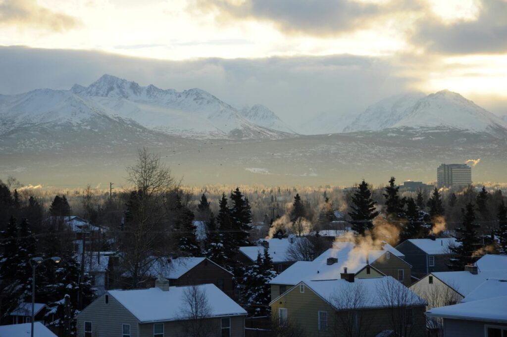 anchorage houses snow mountains