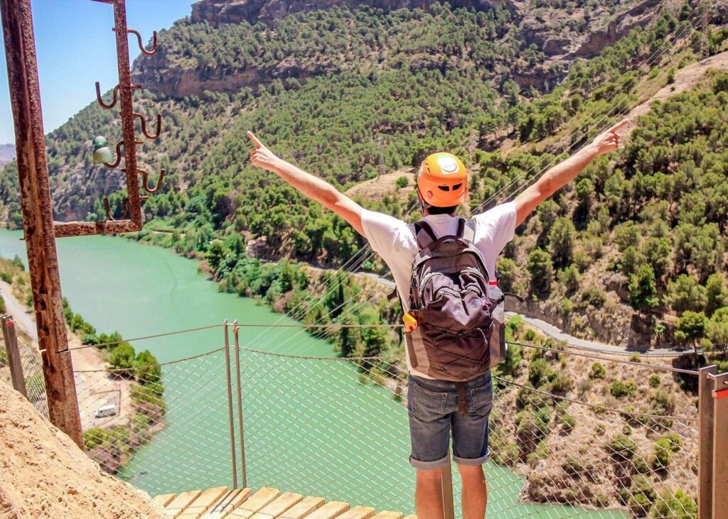 man posing on caminito del rey