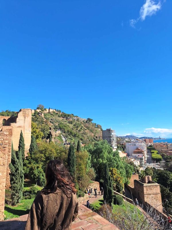 lady posing alcazaba viewpoint