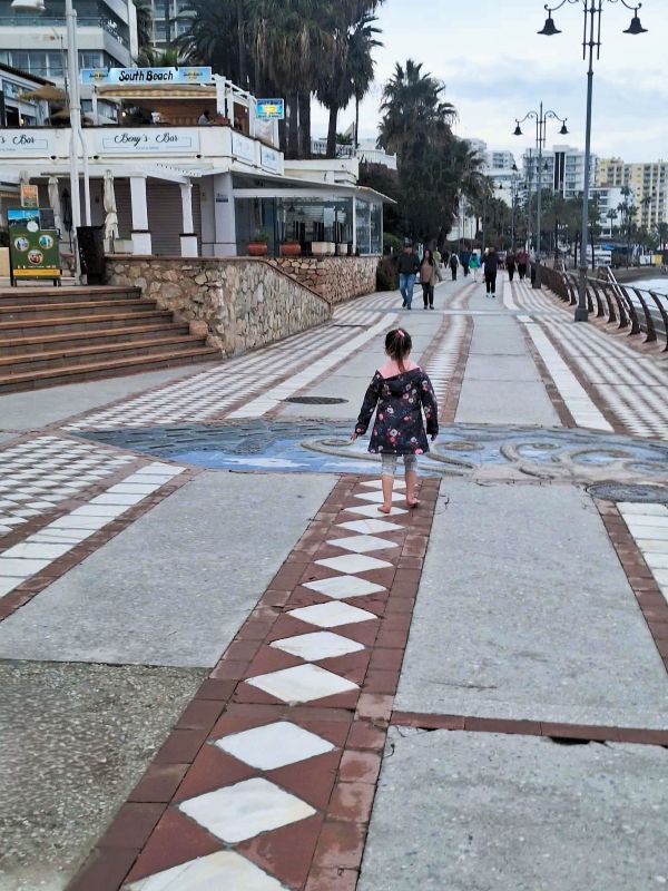 girl benalmadena marina path 