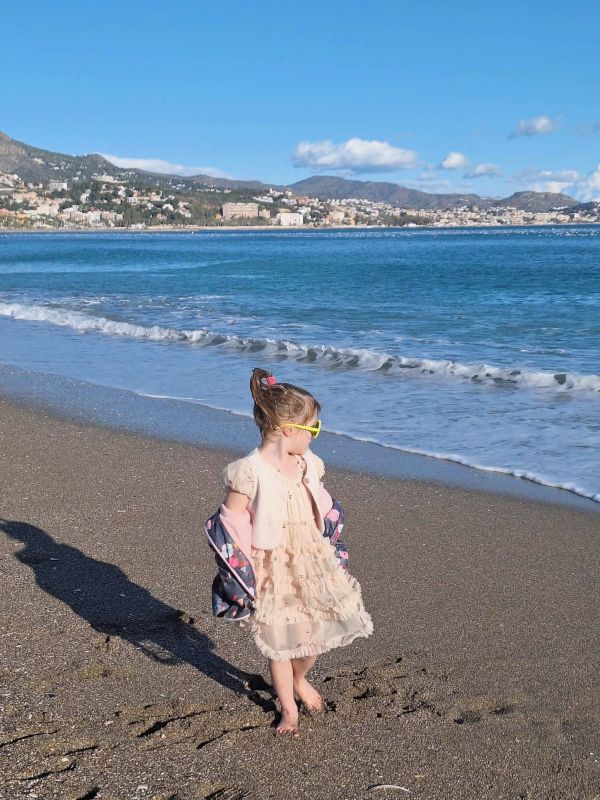 young girl malagueta beach malaga
