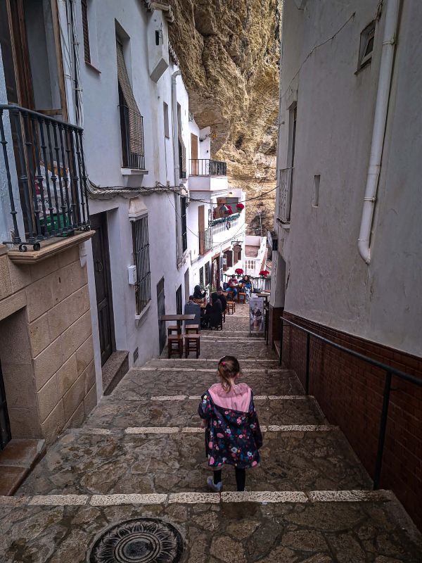 girl narrow street setenil de las bodgas andalucia