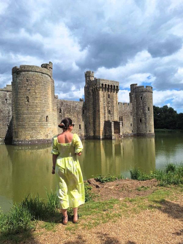 lady posing bodiam castle