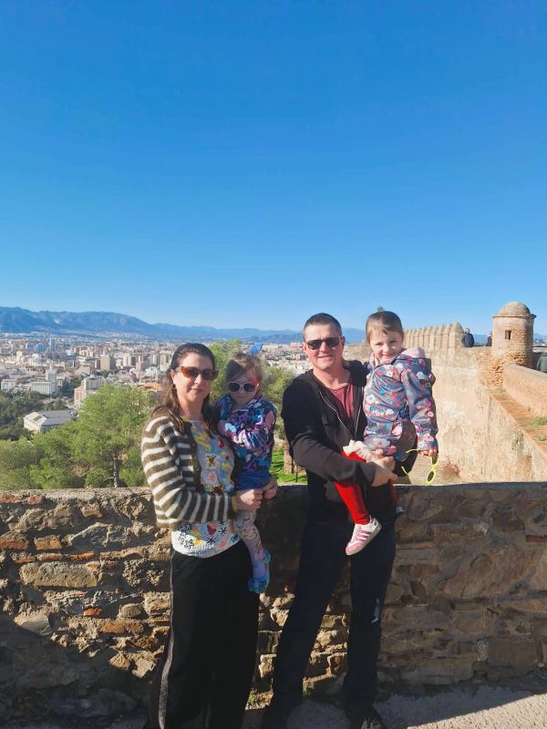 family at gibralforo castle viewpoint