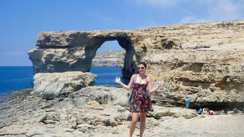 lady posing rocks gozo