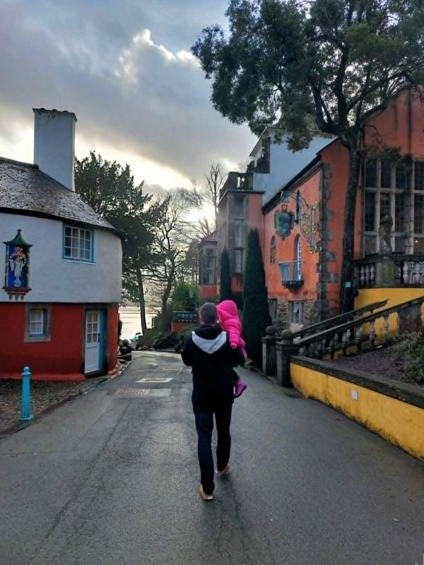 man walking portmeirion street