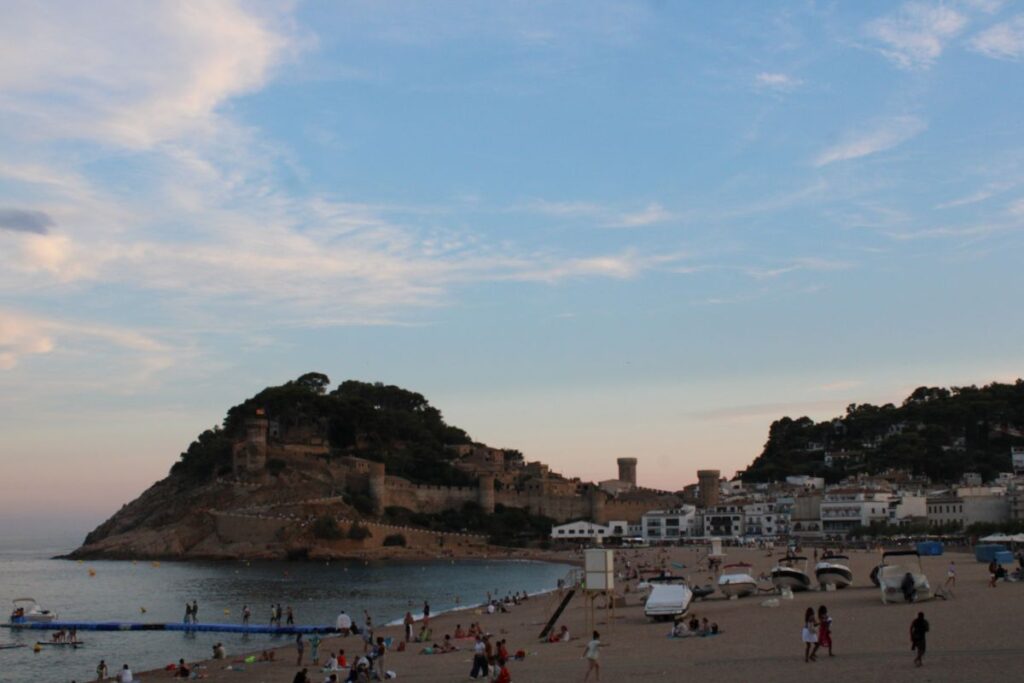 man beach tossa de mar sunset