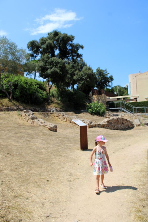 girl roman ruins tossa de mar