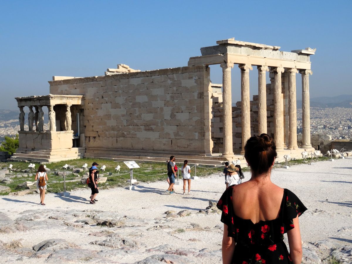 lady acropolis athens morning